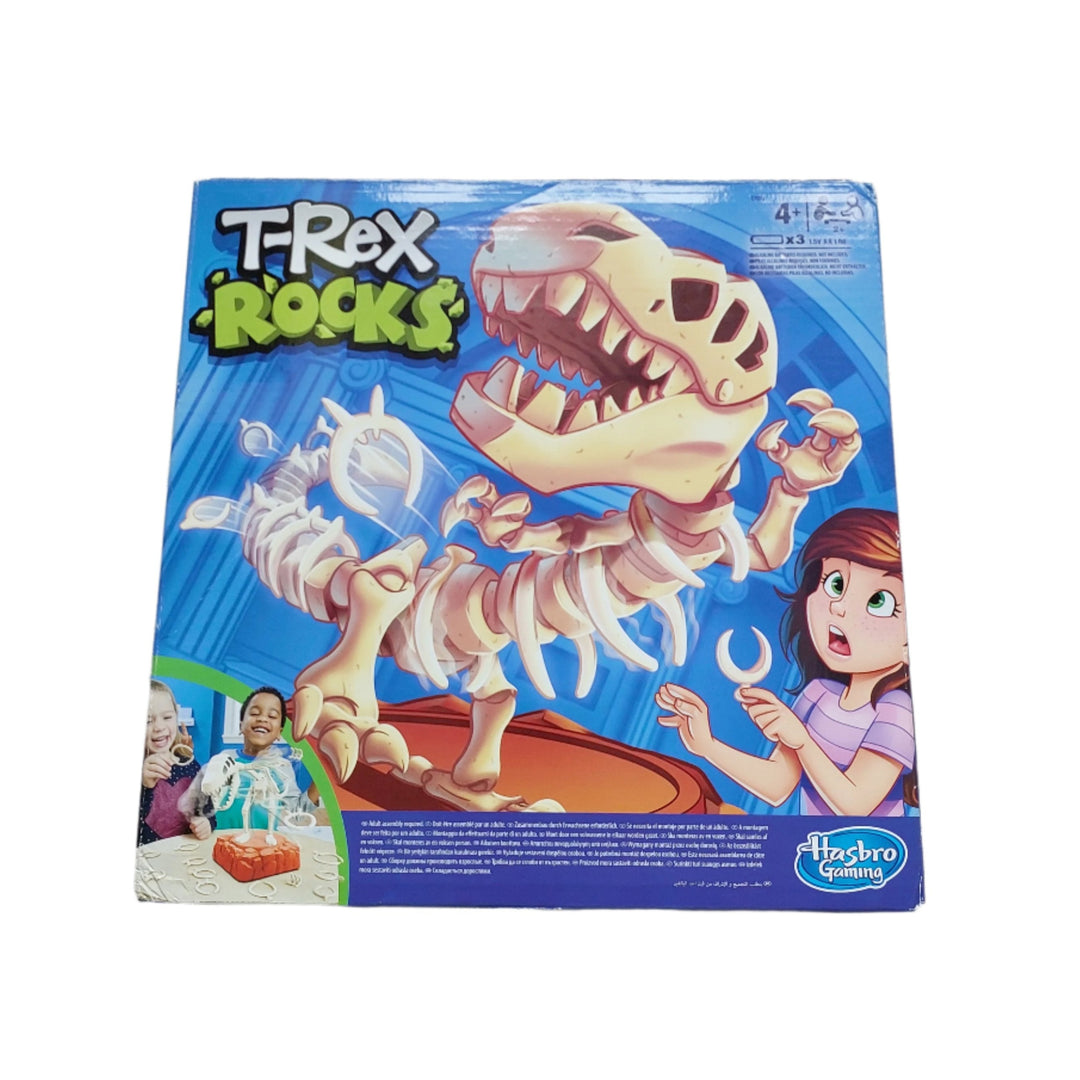 Hasbro, T-Rex Rocks, Don't Wake The T-Rex! In the T-Rex Rocks game, players take turns placing the plastic bones on the dinosaur. Spin the spinner and place the bone that it points to anywhere along the dinosaur's back. But be careful! If a player wakes the dinosaur, he'll shake and that player is out. The last player left wins! Kids love dinosaurs and this game can make a great indoor activity for children and a fun present for girls and boys aged 4 and up.