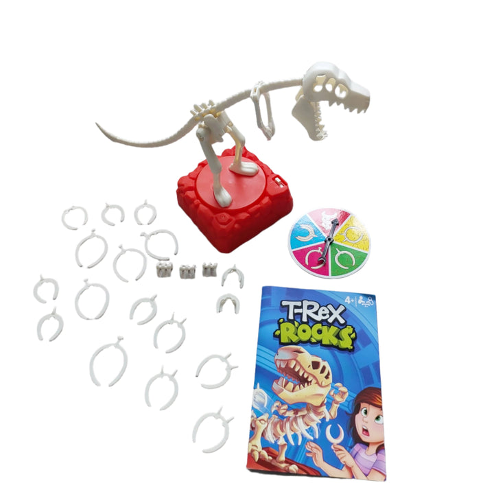 Hasbro, T-Rex Rocks, Don't Wake The T-Rex! In the T-Rex Rocks game, players take turns placing the plastic bones on the dinosaur. Spin the spinner and place the bone that it points to anywhere along the dinosaur's back. But be careful! If a player wakes the dinosaur, he'll shake and that player is out. The last player left wins! Kids love dinosaurs and this game can make a great indoor activity for children and a fun present for girls and boys aged 4 and up.