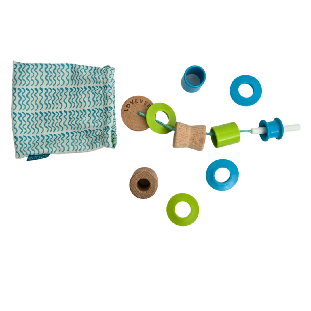 Lovevery, The Adventurer Play Kit, Your toddler is making so many discoveries about the real world at this stage. This Play Kit lets them experiment with cause and effect, use both hands at once to complete a task, and learn about a wider range of emotions.