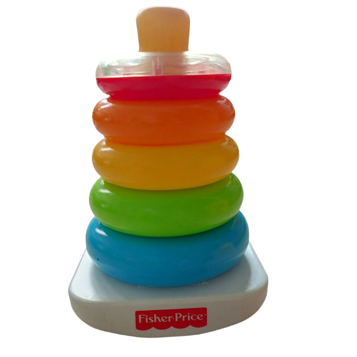 Fisher Price, Fisher Price Rock-A-Stack, The Fisher-Price® Rock-a-Stack® toy offers classic stacking fun for your baby. Younger babies will love grasping, holding, shaking and exploring the five colorful rings. The littlest ring has a shiny, reflective surface for baby to discover insidewith colorful, swirling beads that make fun rattle sounds! When they're ready to sit and play, babies can stack the rings on the post, then bat at the wobbly base to make it rock back and forth. 