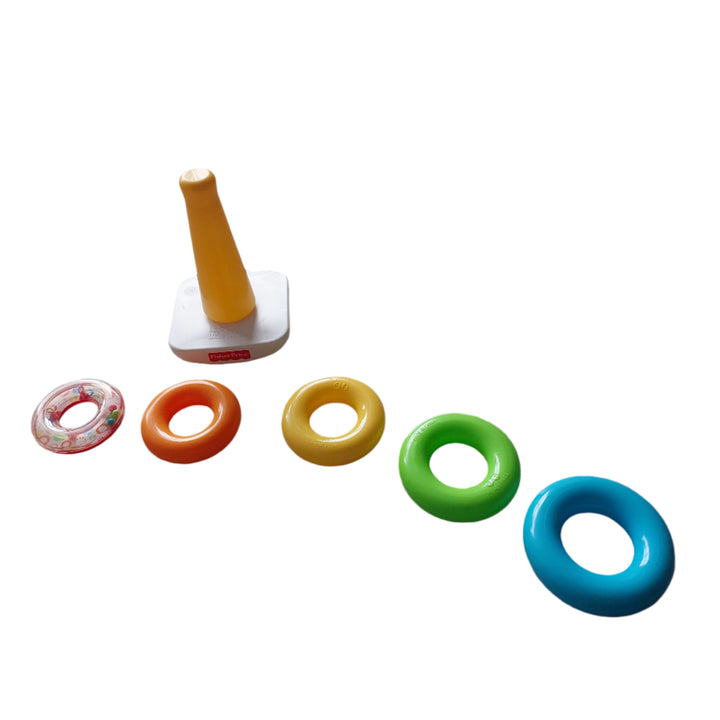 Fisher Price, Fisher Price Rock-A-Stack, The Fisher-Price® Rock-a-Stack® toy offers classic stacking fun for your baby. Younger babies will love grasping, holding, shaking and exploring the five colorful rings. The littlest ring has a shiny, reflective surface for baby to discover insidewith colorful, swirling beads that make fun rattle sounds! When they're ready to sit and play, babies can stack the rings on the post, then bat at the wobbly base to make it rock back and forth. 