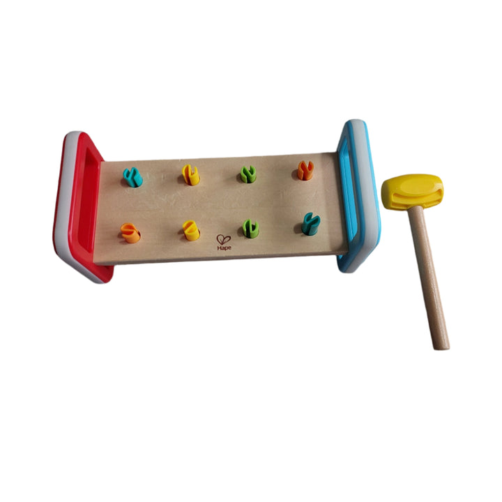 Hammering is fun! Hammer in all the pegs then flip the bench over and start again. Great for developing fine-motor skills.