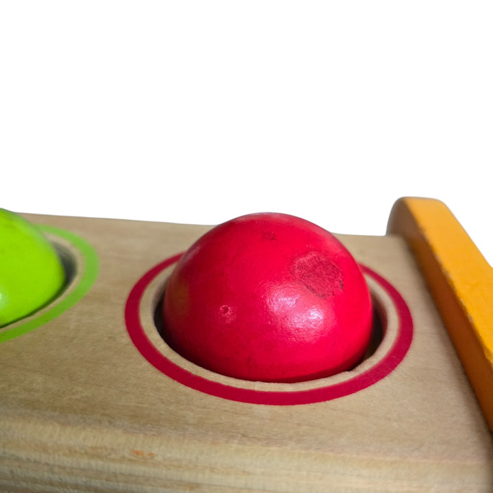 "Hape's Pound and Tap Bench with Slide Out Xylophone is a multifunctional musical delight and sound experience for toddlers.

Toddlers ages 12 months to 3 years can explore different notes and sounds by letting the balls fall on the keys or slide out the xylophone to create their own unique sound with a wooden mallet.

This musical instrument allows for different sounds and melodies making it the ideal introduction to the exciting world of music for your child."