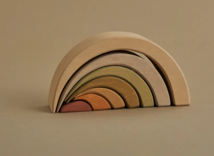 Raduga Grez, Biased Stacker, Sometimes, to generate new ideas you need to shift your usual view just a bit. A biased rainbow inspires so many games like no other toy does. You can combine its details in any way and turn them into a mountainous road for toy cars, or imagine it is the Loch Ness Monster coming out of the lake, or a hole of some tiny creature. Biased rainbow will turn on your imagination and inspire its fascinating work!