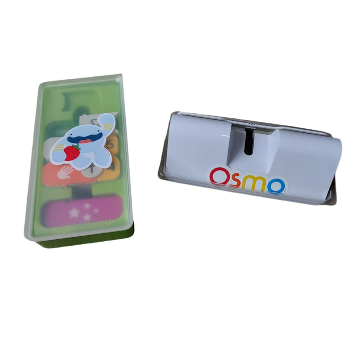 Osmo, Coding Starter Kit, Use hands-on physical blocks, coding commands, to control the character Awbie on a fun-filled adventure (Coding Awbie), an introduction to coding. Use coding blocks to learn coding's creative side while developing an ear for rhythm, melody, and harmony - make your beat come alive, learn patterns & loops with over 300+ musical sounds (Coding Jam). Share a composed Jam with family, friends & the Jam community. Solve advanced side-by-side coding puzzles solo or with others, playing at