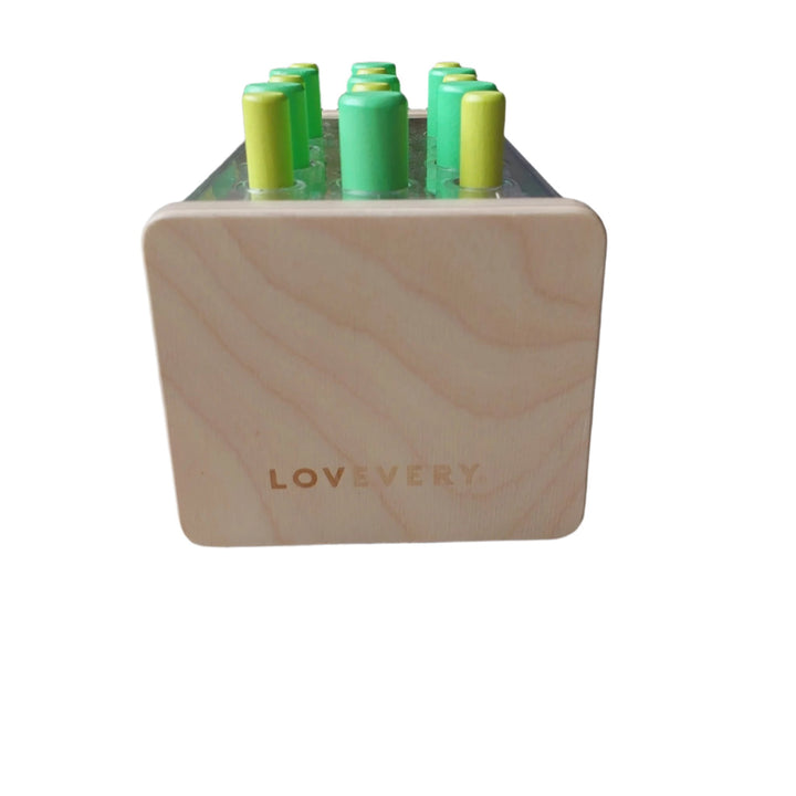 Lovevery, Wooden Posting Stand (Companion Play Kit), Encourage hand-eye coordination and build problem-solving strategies with this 3D puzzle.