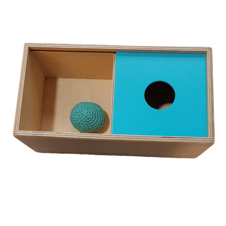 Peekaby, Object Permanence Box with Ball, It helps babies understand "object permanence" and develop problem-solving skills. Your baby will move the lid from side to side to find the ball disappeared from sight.