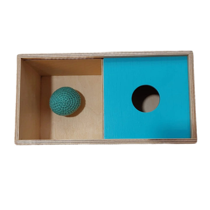 Peekaby, Object Permanence Box with Ball, It helps babies understand "object permanence" and develop problem-solving skills. Your baby will move the lid from side to side to find the ball disappeared from sight.