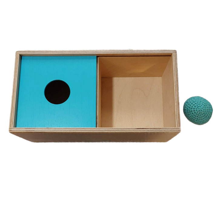 Peekaby, Object Permanence Box with Ball, It helps babies understand "object permanence" and develop problem-solving skills. Your baby will move the lid from side to side to find the ball disappeared from sight.