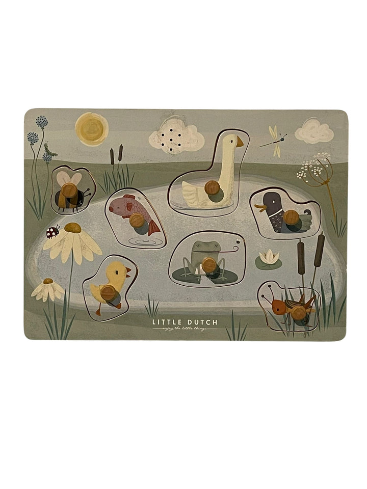 Children's puzzle with animal illustrations on a cardboard backing, featuring the brand 'Little Dutch'.