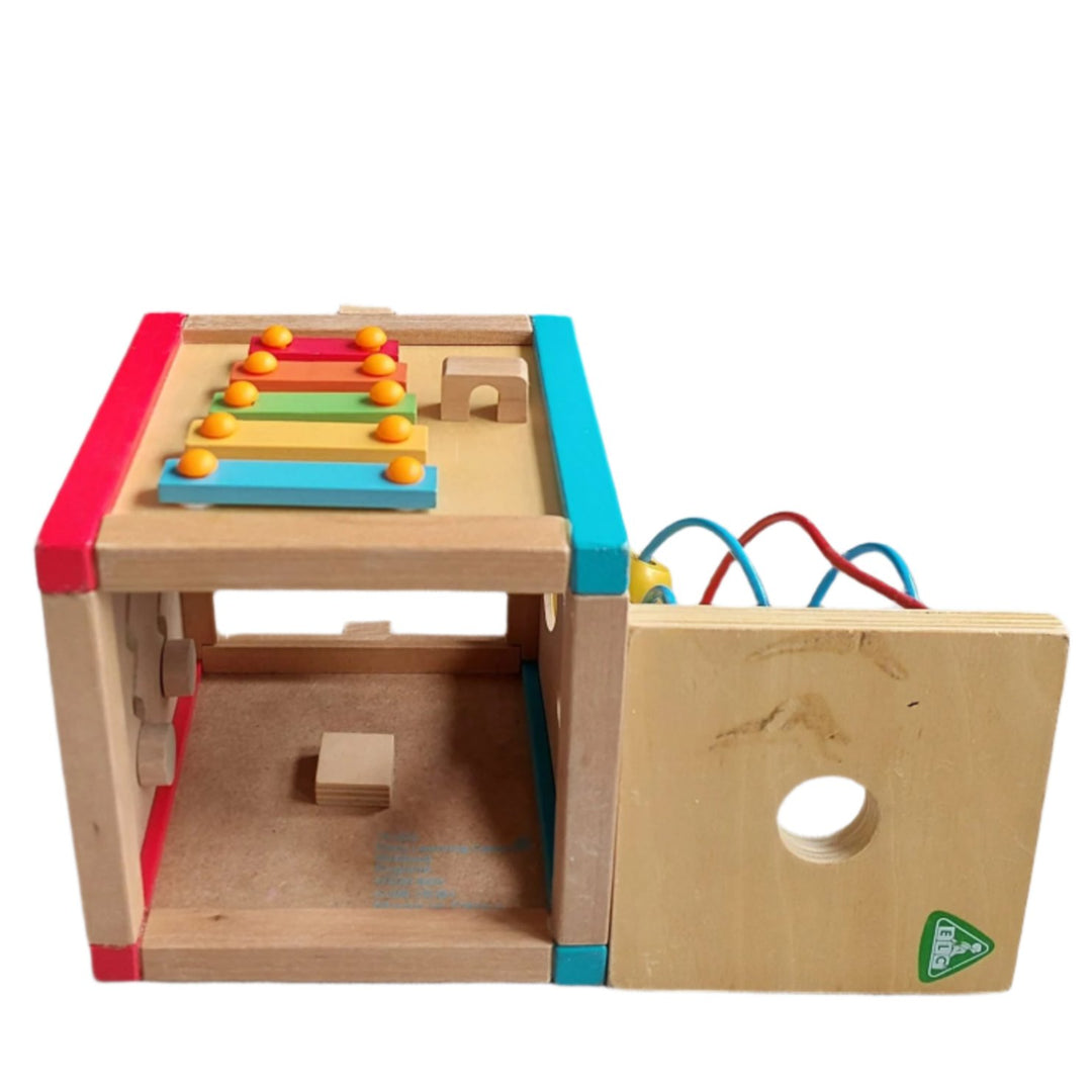 ELC, Early Learning Centre Mini Wooden Activity Cube, The Mini Wooden Activity Cube features vibrant colors and five activities. This classic wooden toy is perfect for fine motor skills, hand-eye coordination, and problem solving and is filled with early learning opportunities. The interactive features help little fingers get nimble for dressing, drawing, and writing, boosts your child’s reactions, and encourages your child to think creatively.