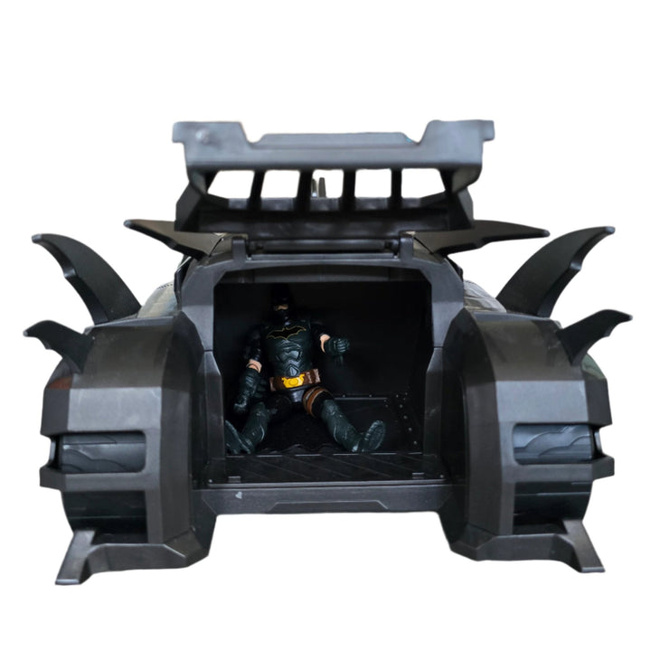 DC Comics, Make room for the Crusader Batmobile. With Batman as a 10-centimetre figure at the wheel, the sleek, pilotless car races through the streets of Gotham City in search of villains. Joker, Sharkman and Mr. Freeze are included in the set as cardboard figures.