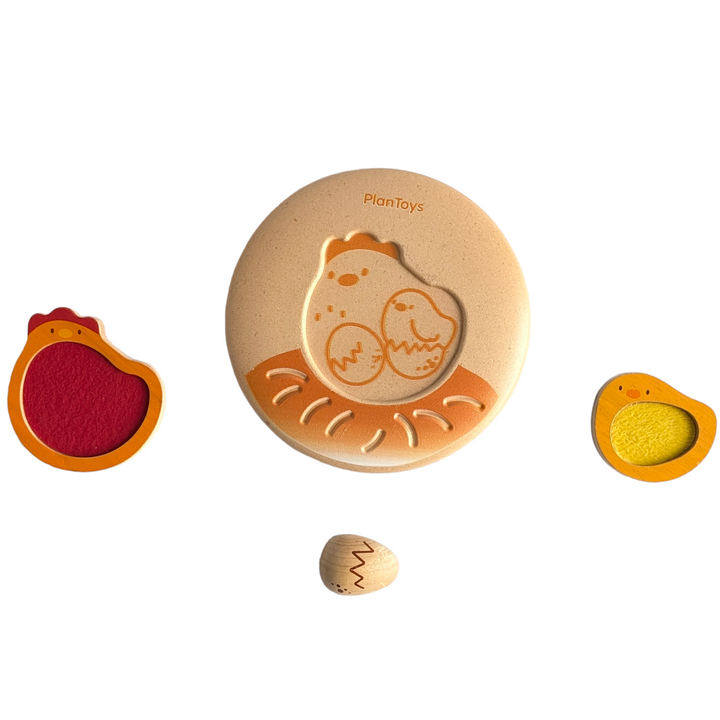 PlanToys, Chicken Puzzle, Cognitive & Motor Skills Development, Enjoy with this chicken theme puzzle! This puzzle helps kids learn about a chicken’s life cycle as well as encourages problem solving and fine motor skills.

This puzzle consists of 4 pieces including the puzzle mat and has a puzzle on both sides

Each piece has a different texture for sensory play

The puzzle is 3D and has more than one way to solve

Sustainably made in Thailand using chemical-free rubberwood, formaldehyde-free glue, organic p
