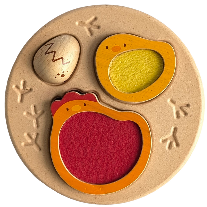 PlanToys, Chicken Puzzle, Cognitive & Motor Skills Development, Enjoy with this chicken theme puzzle! This puzzle helps kids learn about a chicken’s life cycle as well as encourages problem solving and fine motor skills.

This puzzle consists of 4 pieces including the puzzle mat and has a puzzle on both sides

Each piece has a different texture for sensory play

The puzzle is 3D and has more than one way to solve

Sustainably made in Thailand using chemical-free rubberwood, formaldehyde-free glue, organic p